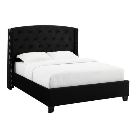 Close-up of tufted black velvet upholstery on headboard