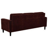 Side profile of Ruth 77-inch Rust Red Fabric Sofa