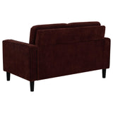 Rear view of Ruth loveseat upholstery and frame