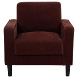 Side view of Ruth rust red fabric accent chair