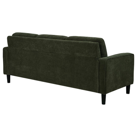 Close-up detail of Ruth sofa fabric and arm