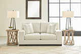 Side view showing Maggie Birch upholstery texture