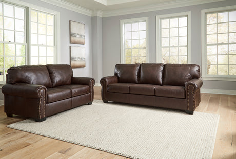 Colleton dark brown sofa and loveseat side view