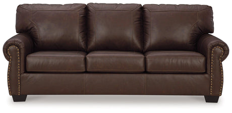 Colleton Dark Brown Leather Sofa side view showing armrest and nailhead trim