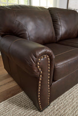 Close-up of nailhead trim on Colleton loveseat arm