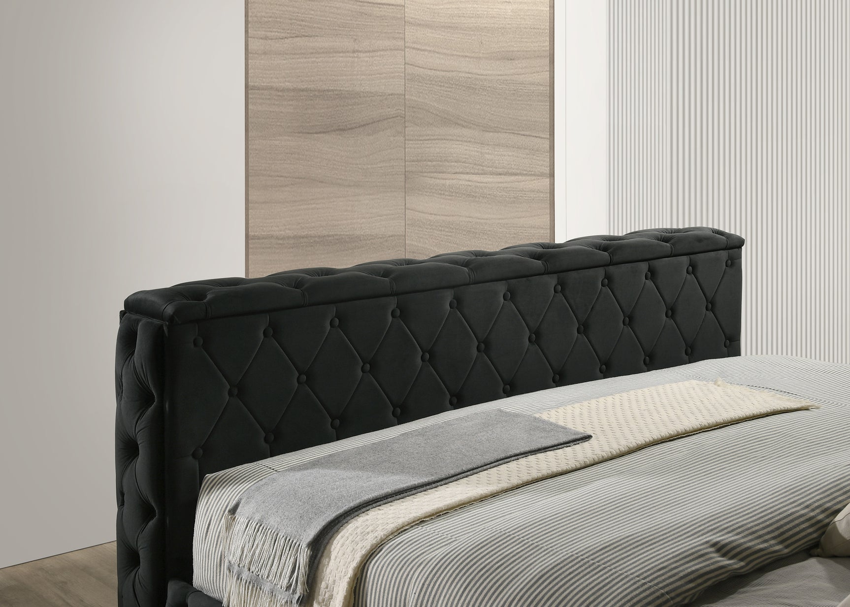 Side view of Josephine Black King Bed upholstery and frame