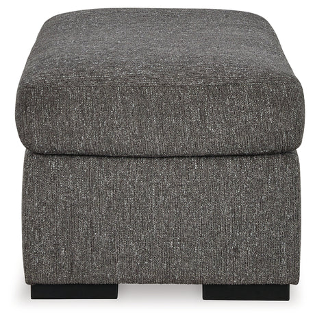 Ottoman usable as footrest or extra seating