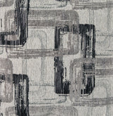 Gardiner pewter chair and ottoman angled view