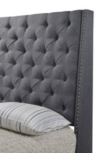 Detail of wood frame and metal legs on Chantilly King Bed