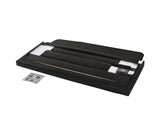 Angled view of Erin Twin Upholstered Bed in black PU leather