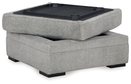 Open ottoman showing hidden storage compartment