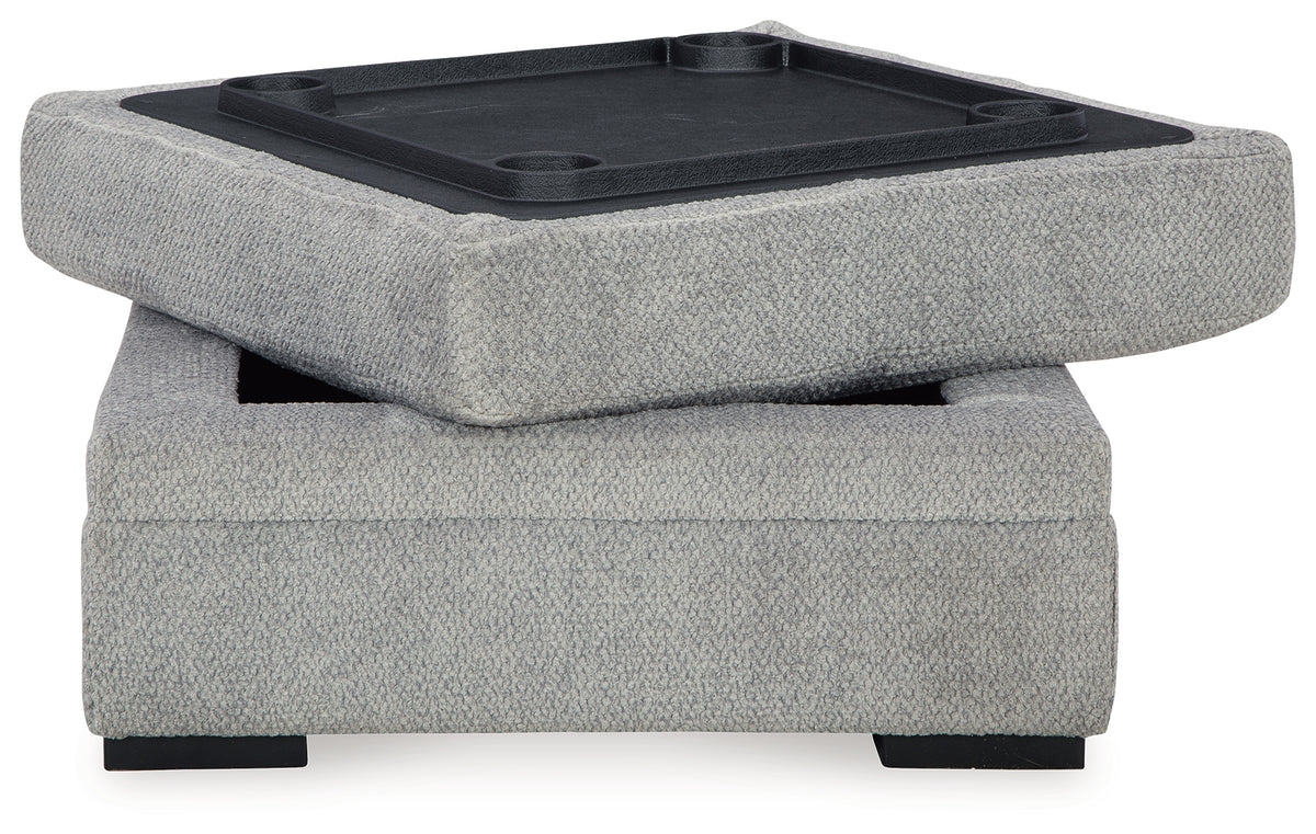 Room angle view with sectional and ottoman