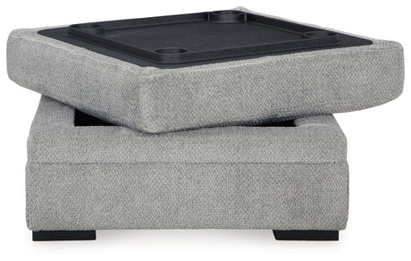 Room angle view with sectional and ottoman