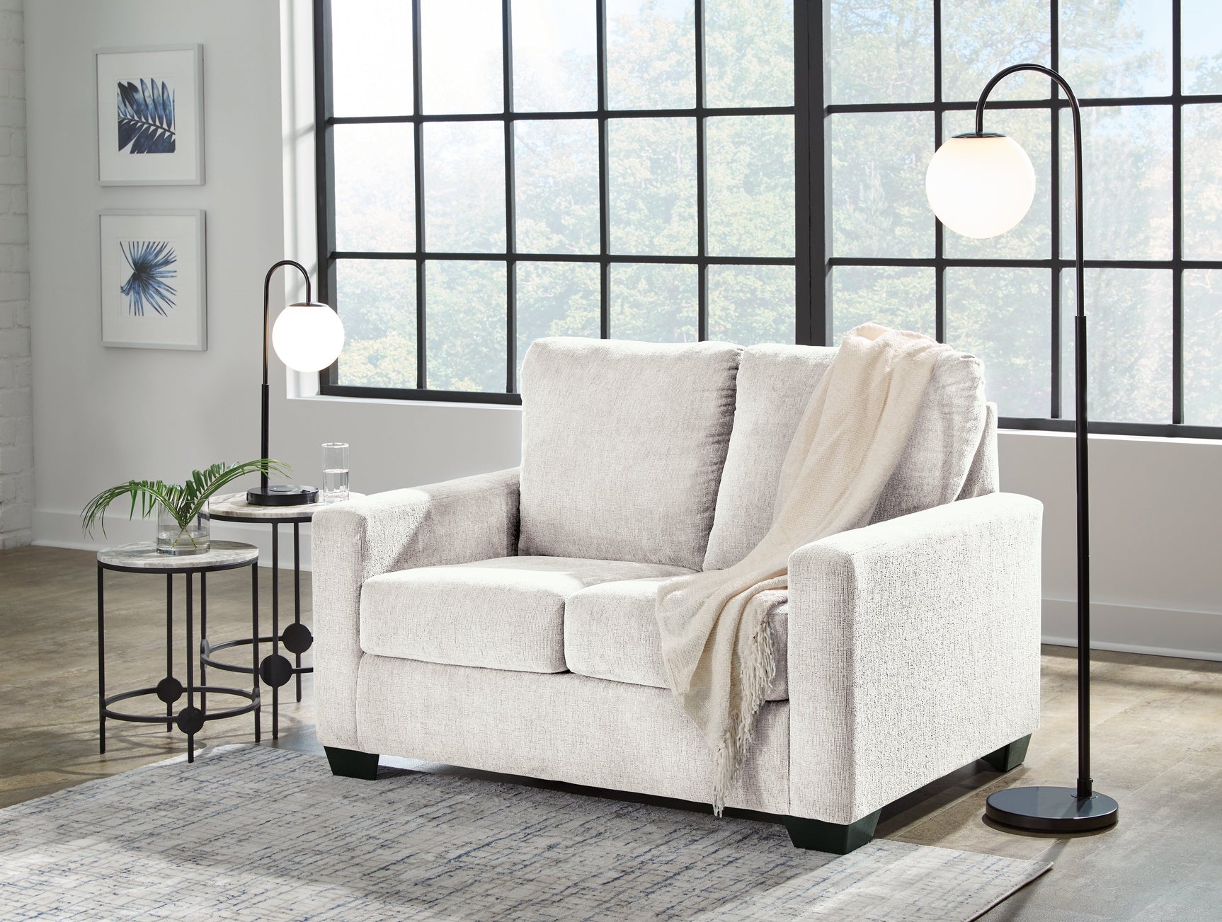 Side angle of Rannis twin sofa sleeper closed