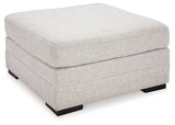 side angle view highlighting sectional sofa cushions