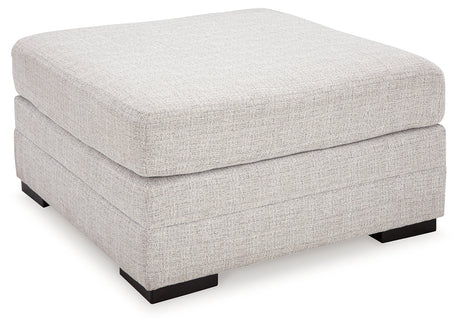 side angle view highlighting sectional sofa cushions