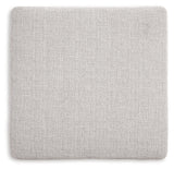 Exposed faux wood finish feet of Koralynn Ottoman