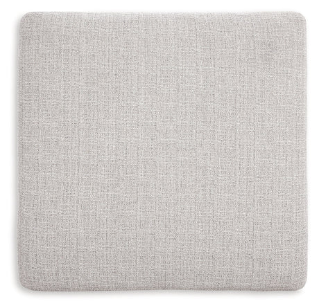 Exposed faux wood finish feet of Koralynn Ottoman