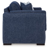 Close-up side detail of Evansley Navy Sofa and Loveseat