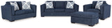 Side view of Evansley Navy Sofa, Loveseat, Chair and Ottoman