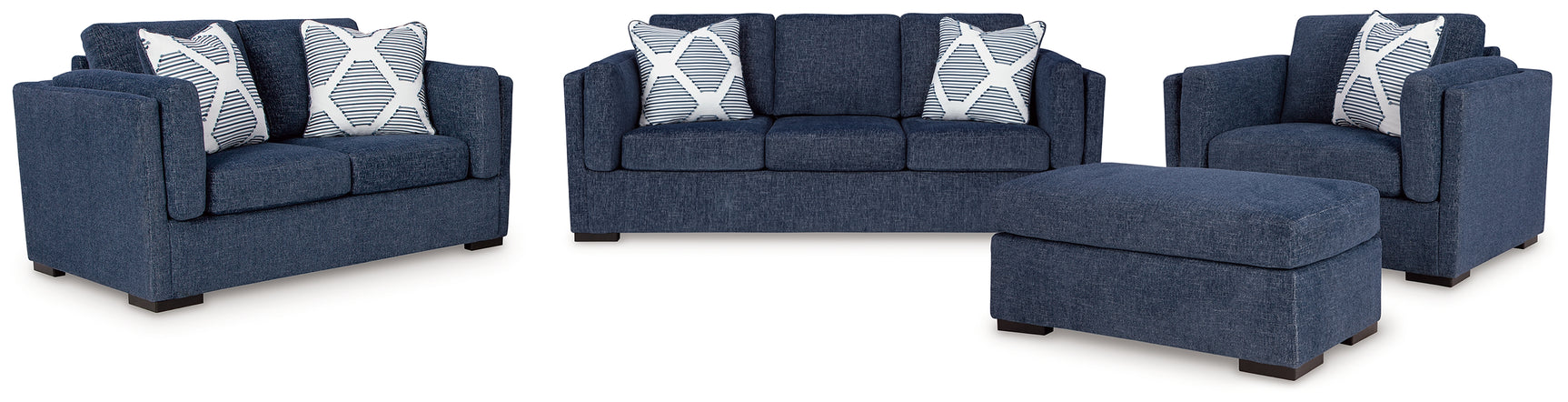 Side view of Evansley Navy Sofa, Loveseat, Chair and Ottoman