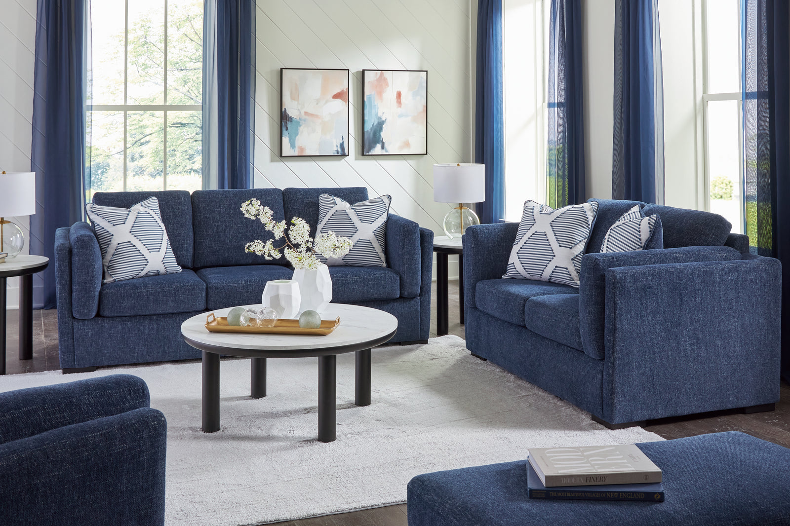 main view of Evansley Navy Sofa, Loveseat, Chair and Ottoman furniture