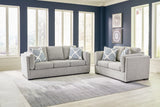 Side view of Evansley Pewter Sofa and Loveseat