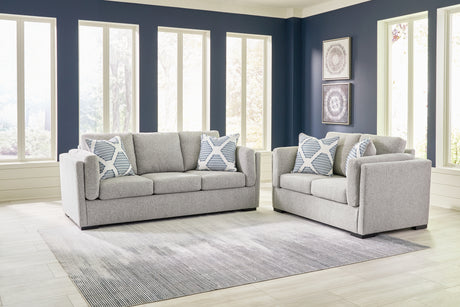 Side view of Evansley Pewter Sofa and Loveseat