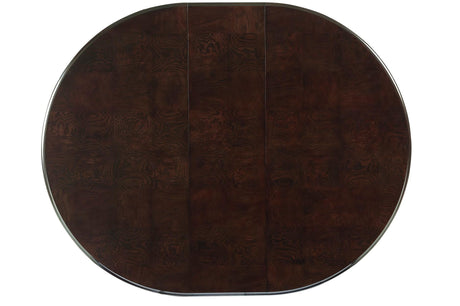 top view of round espresso finished dining table in Savion Dining Set