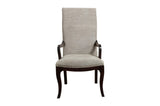 angled view of Savion Dining Set with chairs arranged around round table