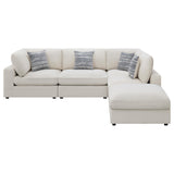 Detail view of beige fabric upholstery and foam cushions on Serene sectional
