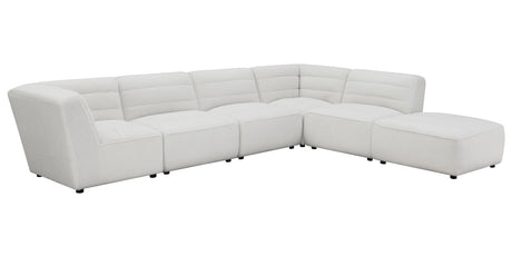Sunny Ottoman in living room setting with sectional