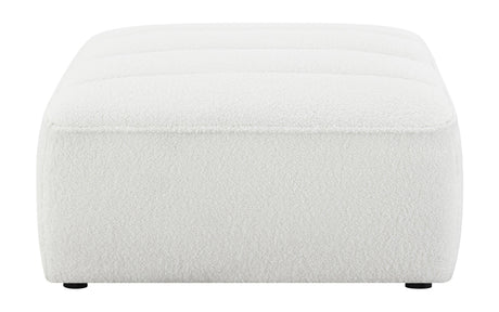 Sunny Ottoman side profile showing channel tufting
