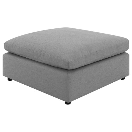Side view of Raleigh grey boucle upholstered ottoman