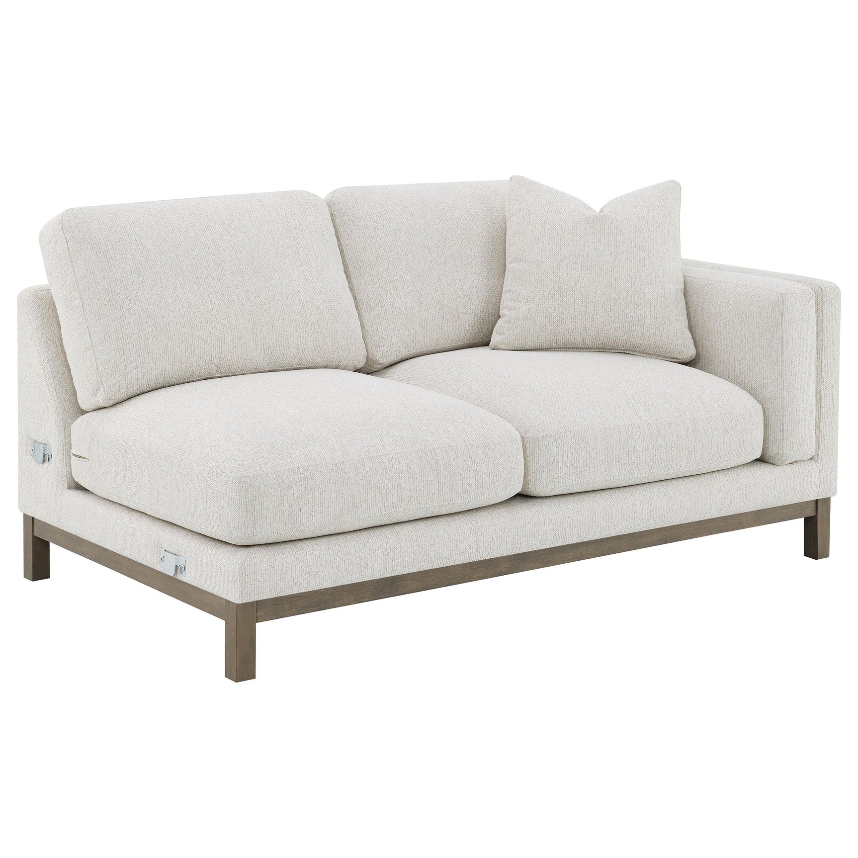 Textured boucle upholstery detail on sectional sofa