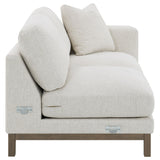 Room setting with sectional sofa and chaise in sand