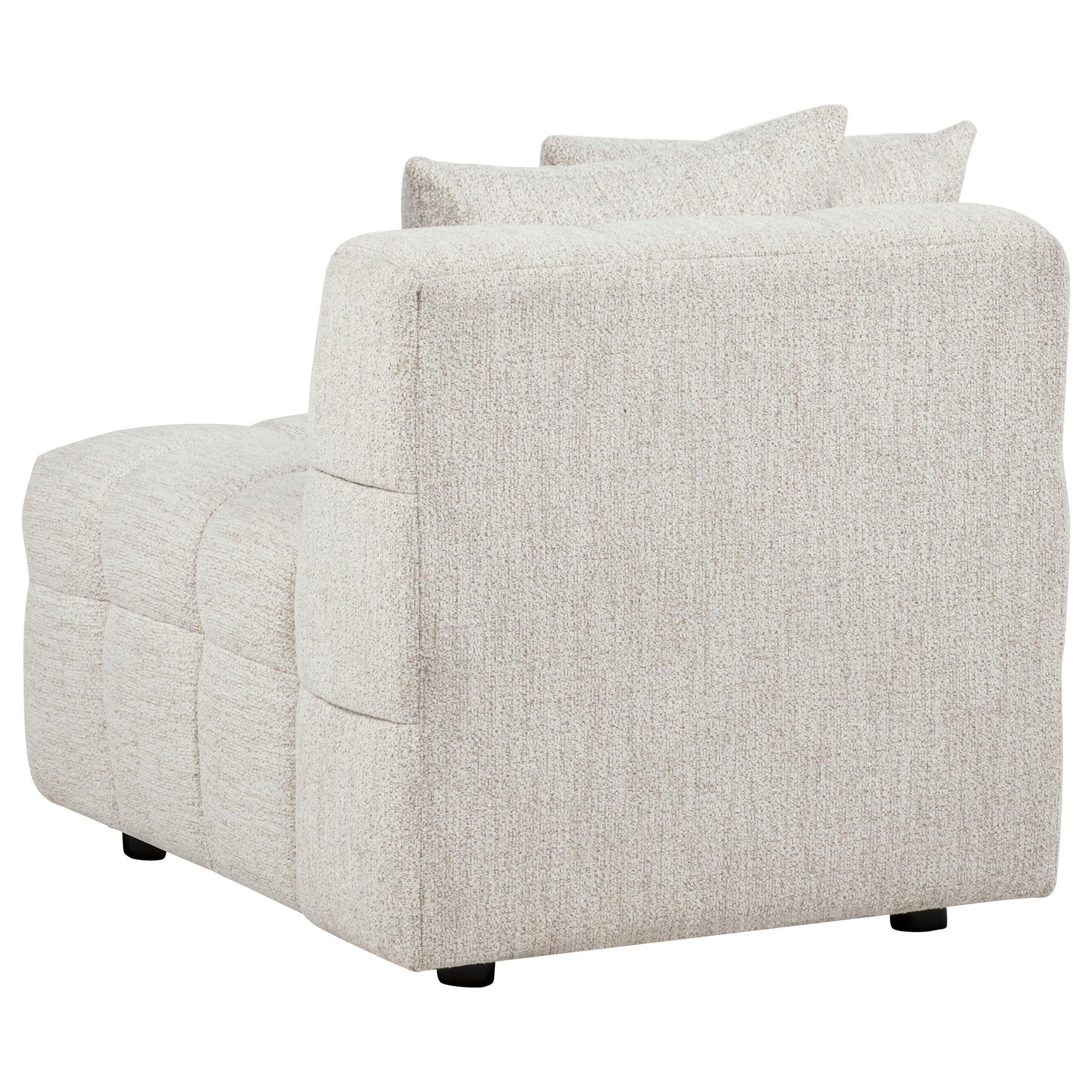 Close-up of tufted fabric seat on Amara Armless Chair