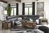 Sectional with decorative pillows in living room setting