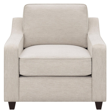 Christine beige upholstered cushion back chair side angle with arms