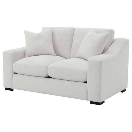 Ashlyn loveseat angled view with accent pillows