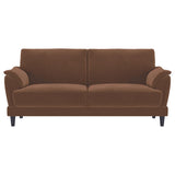 Close-up detail of rust velvet upholstery on Selma sofa