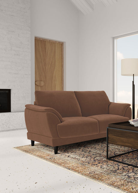 Selma loveseat closeup of crescent tufted arm