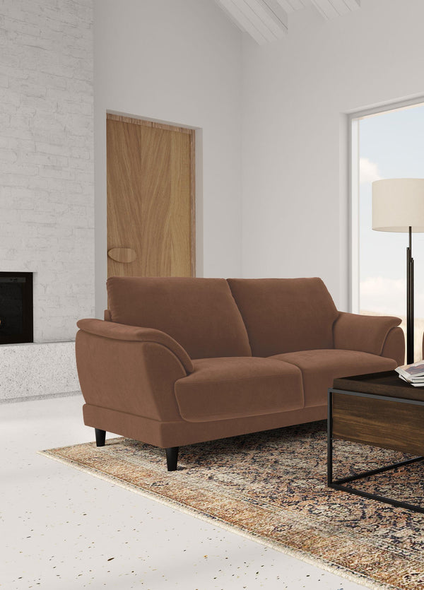 Selma loveseat closeup of crescent tufted arm
