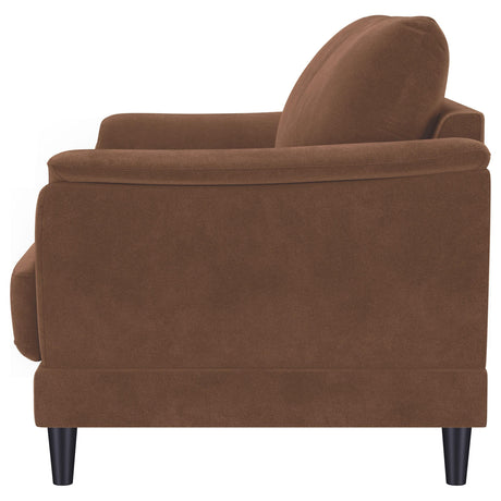 Closeup of rust velvet fabric texture on Selma loveseat