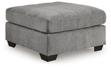 Angle view highlighting sectional shape and ottoman