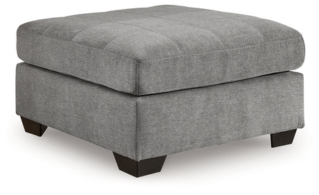 Angle view highlighting sectional shape and ottoman