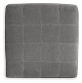 Close-up of Marleton ottoman stitching and fabric