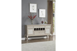 Room view of Crawford silver tufted faux leather dining set