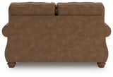 Chasemore Loveseat side view showing profile of turned legs and cushions