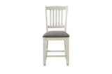 Dining room set side view showing antique white table and chairs